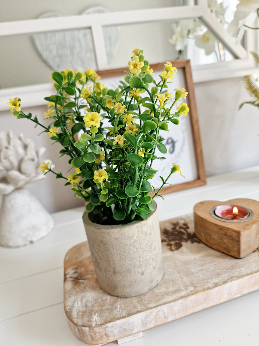Dainty Yellow Floral Plant In Rustic Pot
