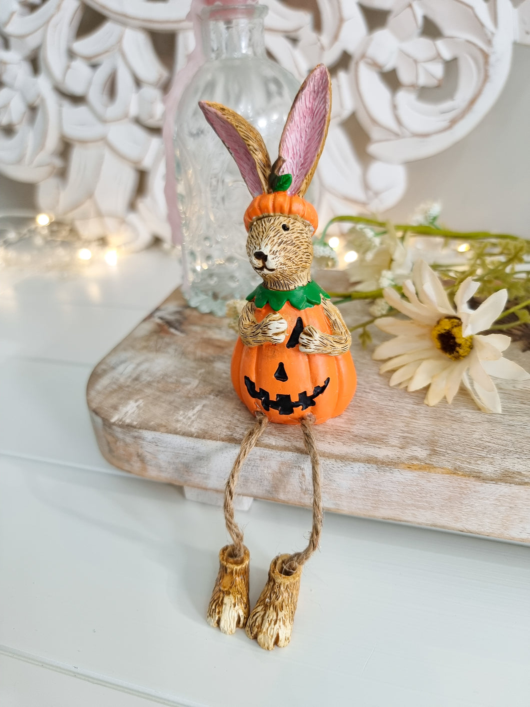 Shelf Sitting Rabbit In Halloween Pumpkin Outfit